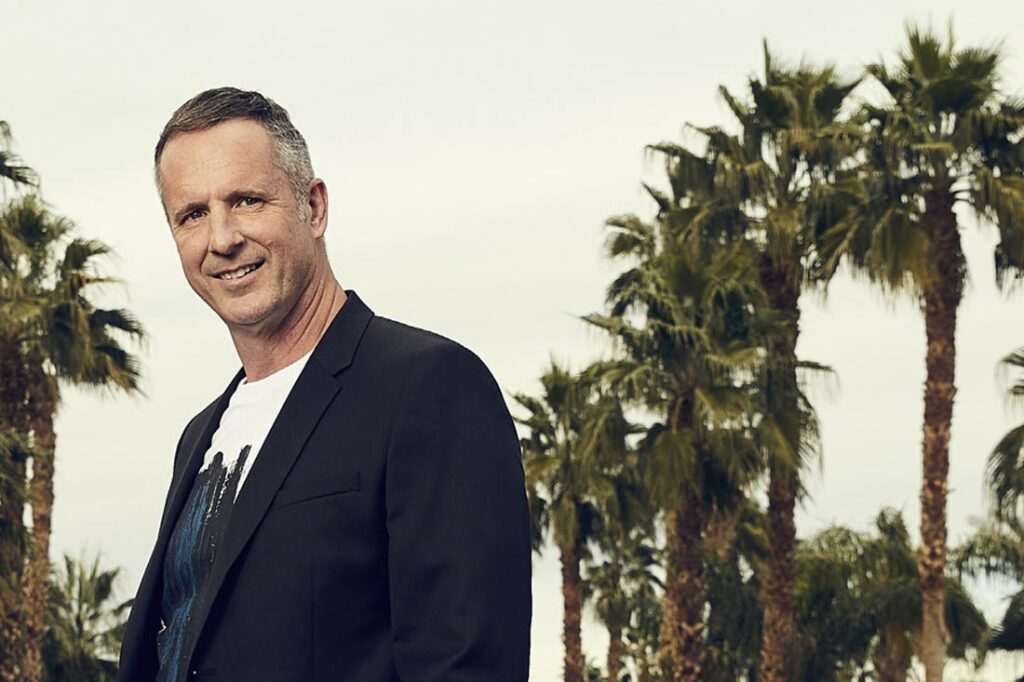 AI leader Glenn Sanford in front of palm trees