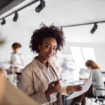 Smiling boss because she's using the ADKAR model of change management