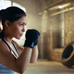 brunette woman boxing