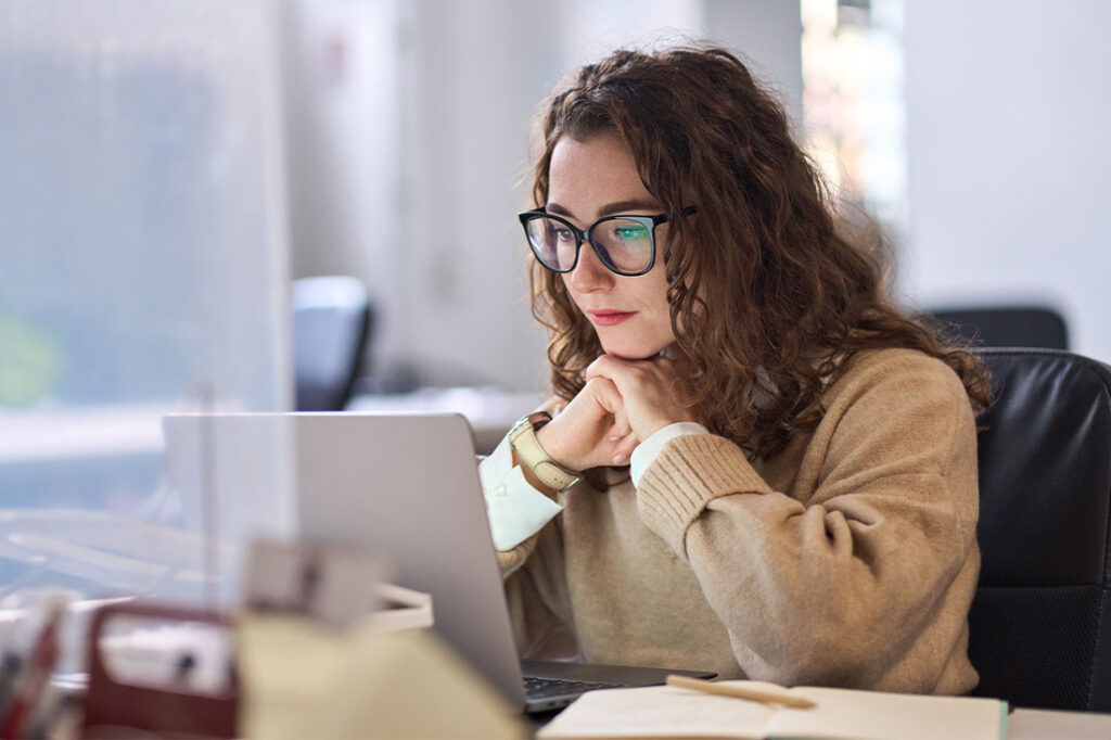 busy professional business woman using laptop