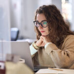busy professional business woman using laptop