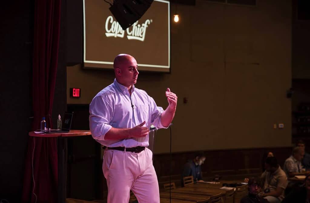 Chris Orzechowski speaking on stage