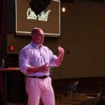 Chris Orzechowski speaking on stage
