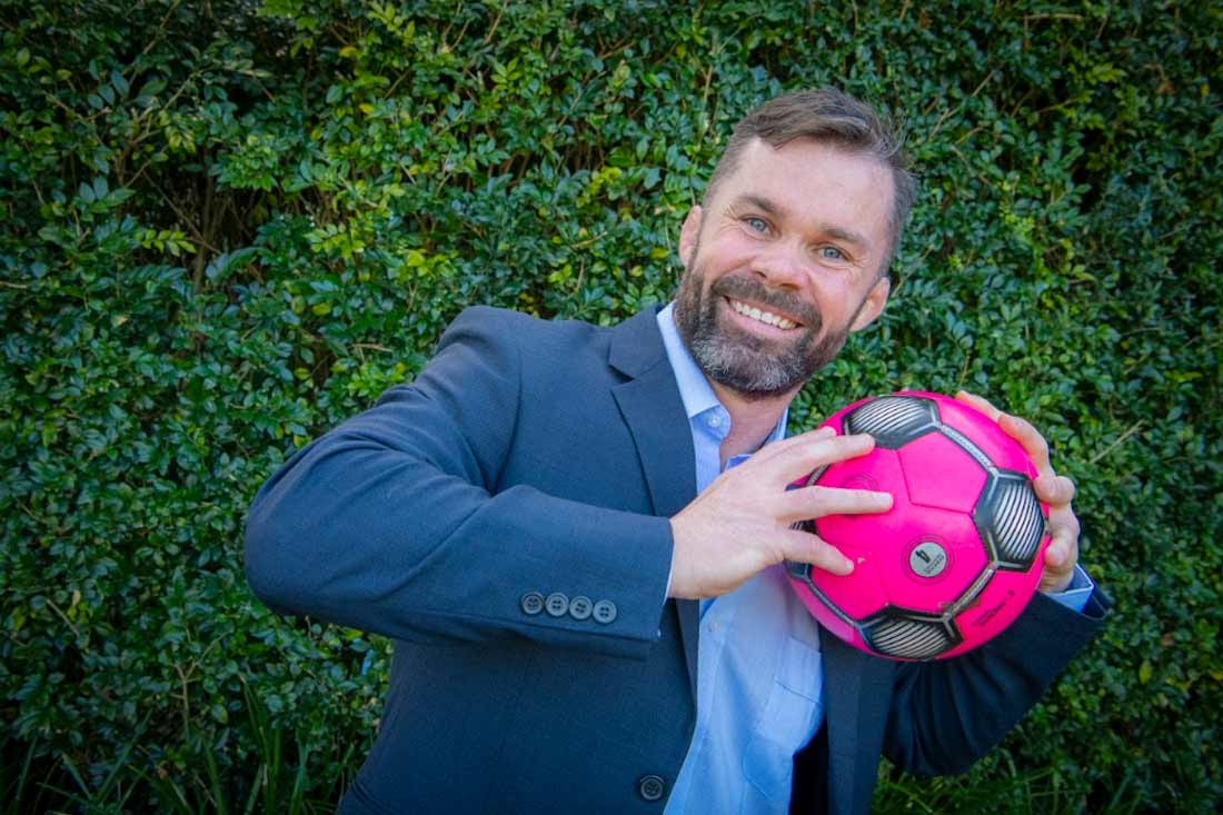 David Lindsay holding a ball