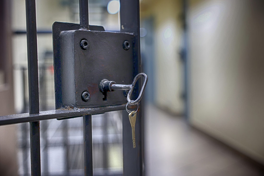 An unlocked prison door exemplifying reentry support