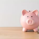 A piggy bank on a wooden table