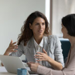 Woman communicates effectively with a colleague