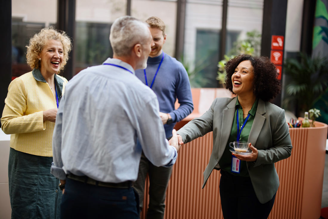 Professionals networking at an event