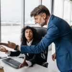 A businesswoman and a businessman having a heated discussion