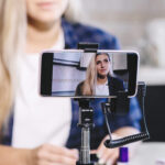 young women recording a video submission for a job interview