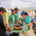 a group of young people learning valuable skills at the St. Pete Youth Farm