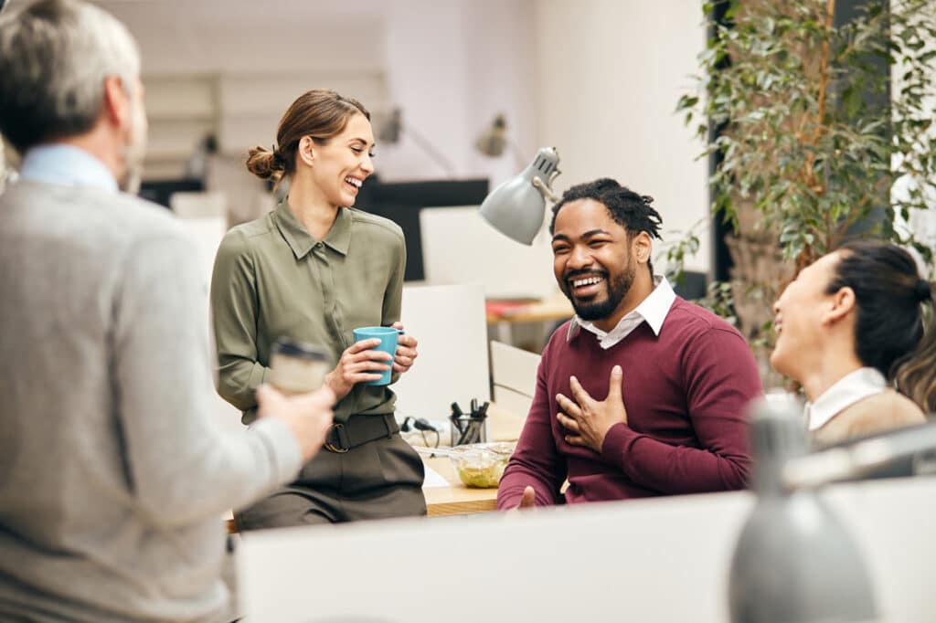 Professionals talking at work using radical candor