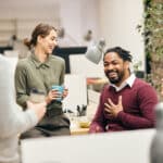 Professionals talking at work using radical candor