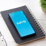 SoFi Invest app pulled up on a phone, used for investing
