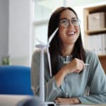 An entrepreneur considers sustainable practices for her business