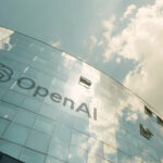 OpenAI logo on the modern office building, view from below