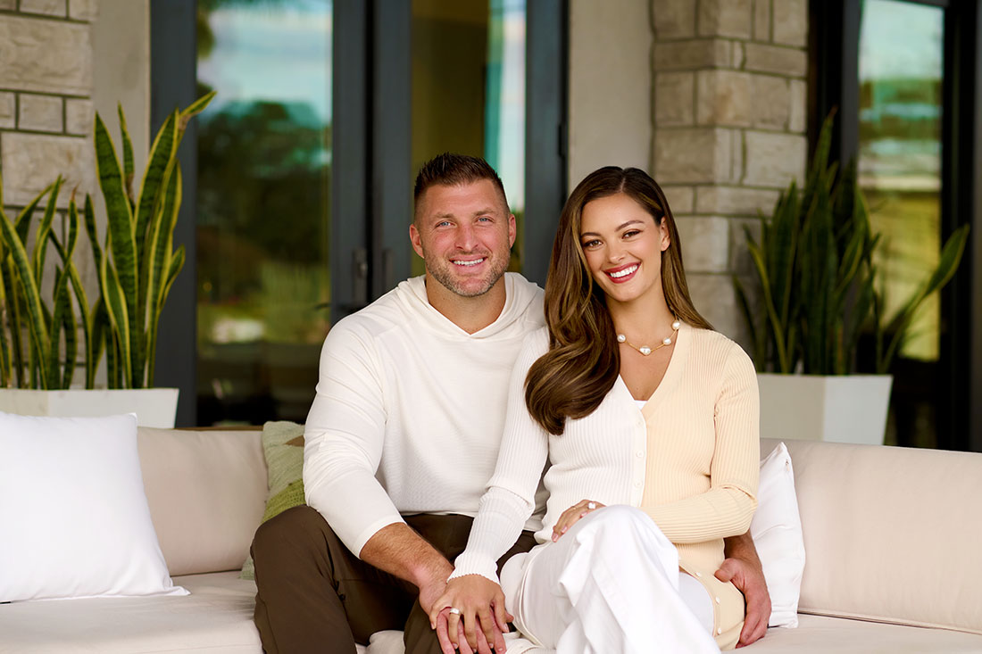 Tim & Demi-Leigh Tebow sitting on couch