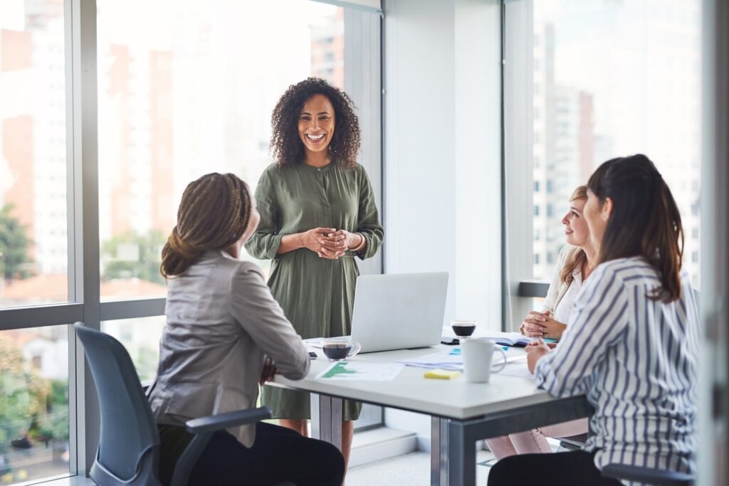 businesswoman leading a team meeting