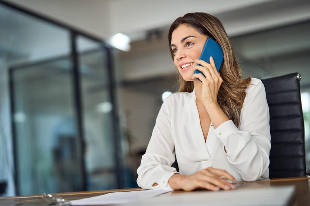 A job applicant responds to a question during a phone screening interview