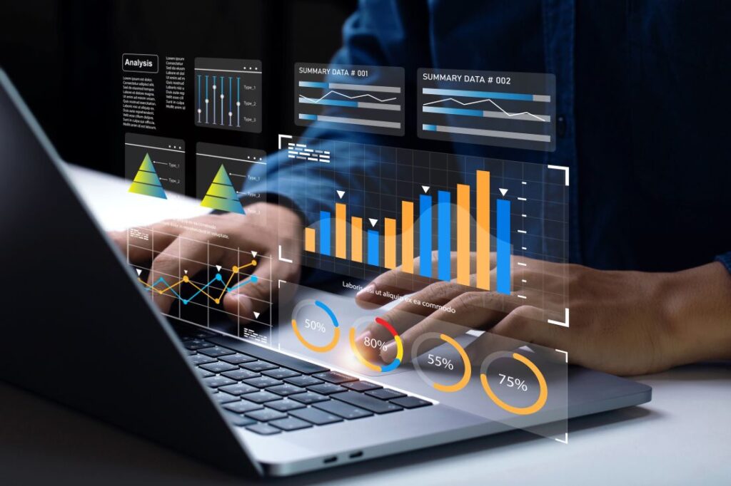 A man uses AI on his laptop to create and analyze data and graphs