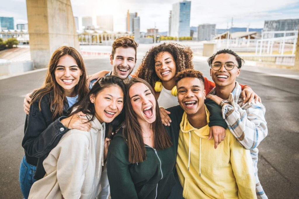 a group of Gen Z friends smiling together