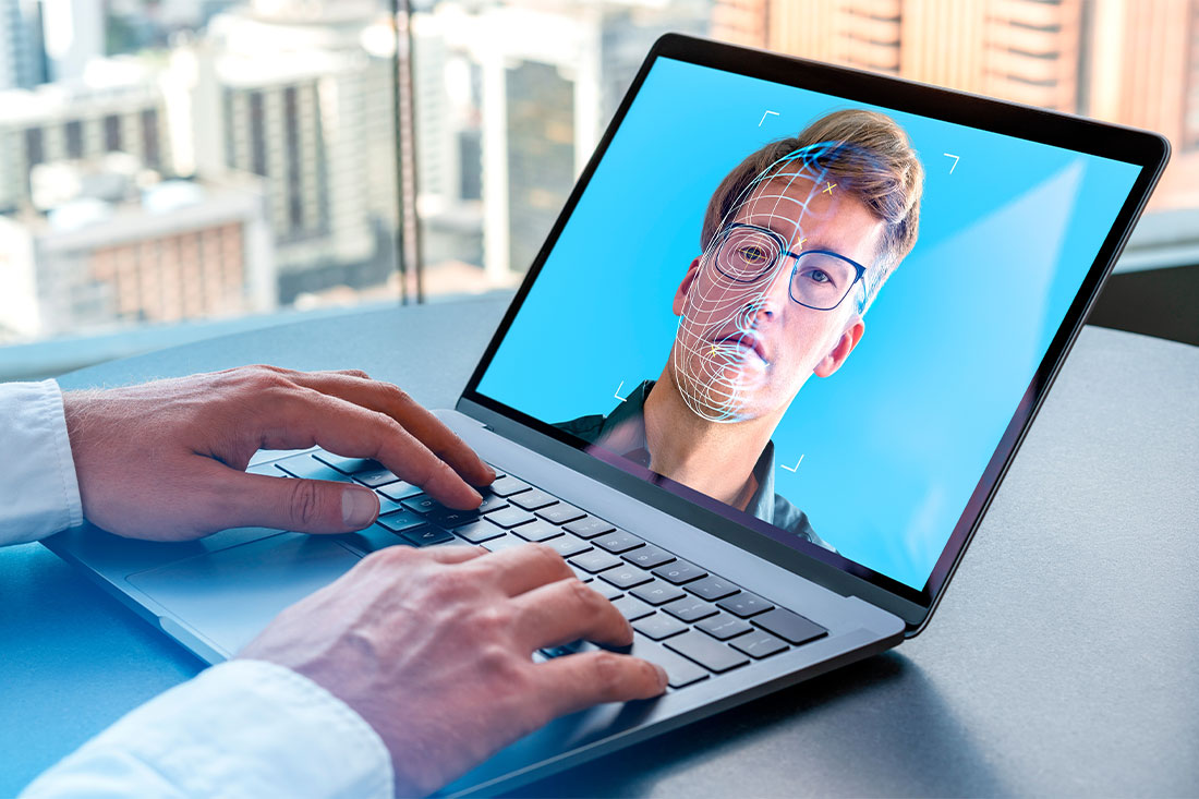 Businessman hands typing on laptop, man face hologram and glowing biometric scanning on computer screen