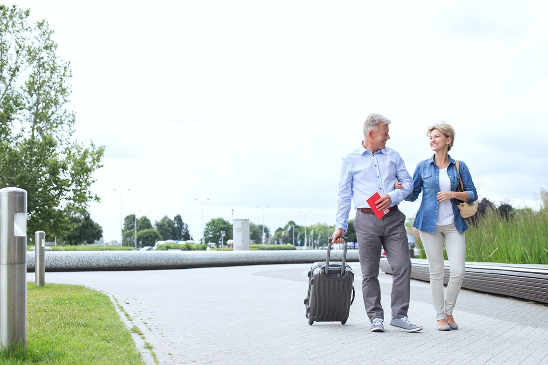 A middle-aged couple travels abroad