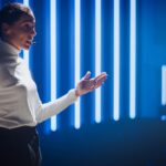 A female speaker on stage