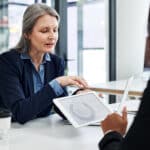 A financial planner meets with a client to discuss their financial goals