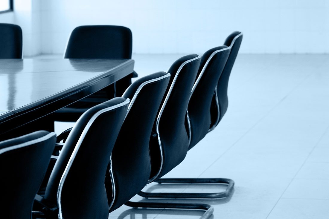 seats at a conference table
