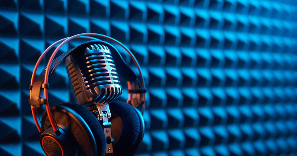A podcasting microphone in a recording studio