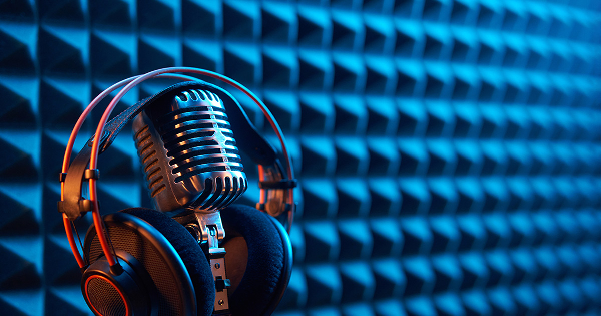 A podcasting microphone in a recording studio