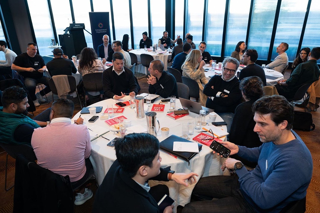 Entrepreneurs mingle at a professional networking event
