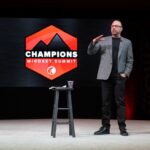 Matt Ebert giving a speech at the Champions Mindset Summit