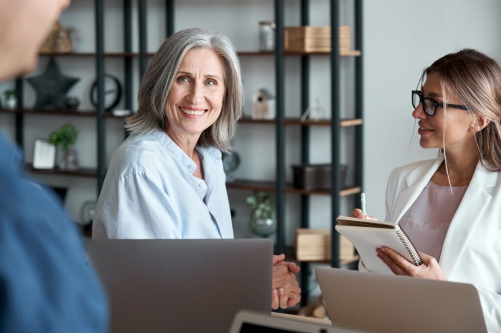 An older woman in a business meeting.