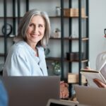 An older woman in a business meeting.