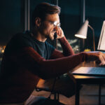 businessman works late at night in an office