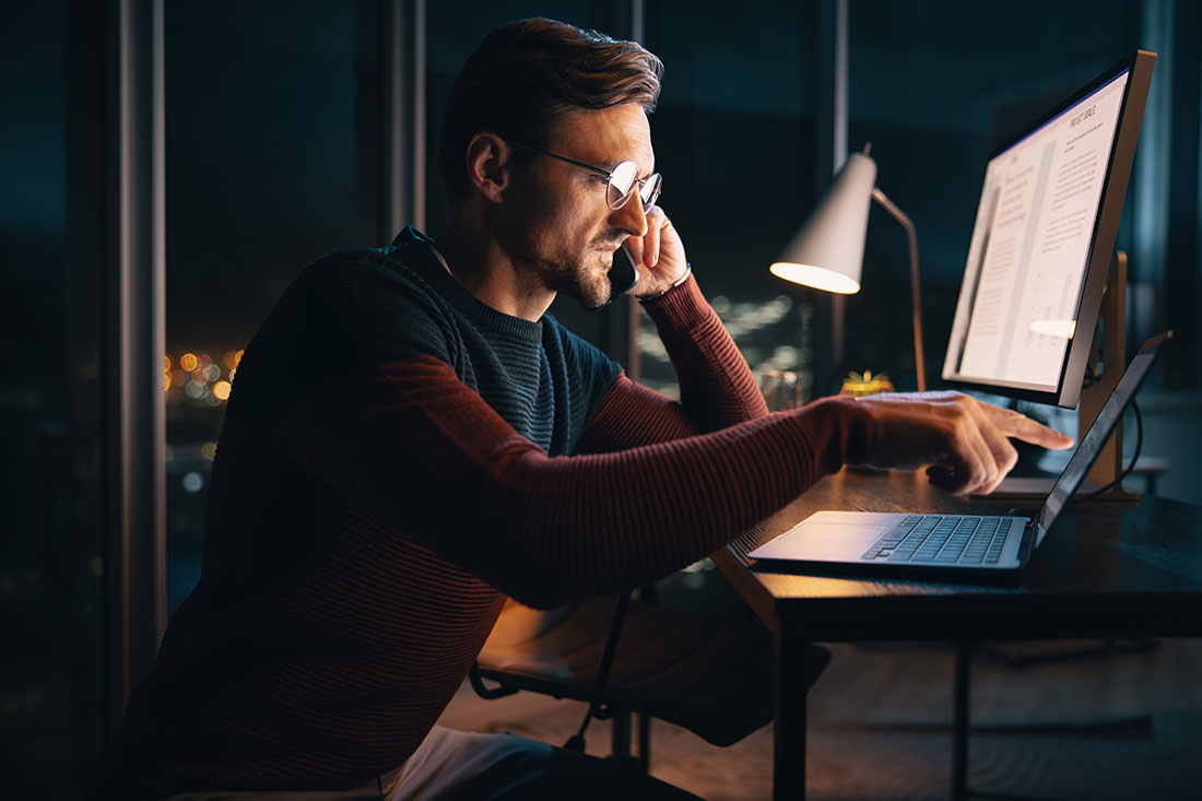 businessman works late at night in an office