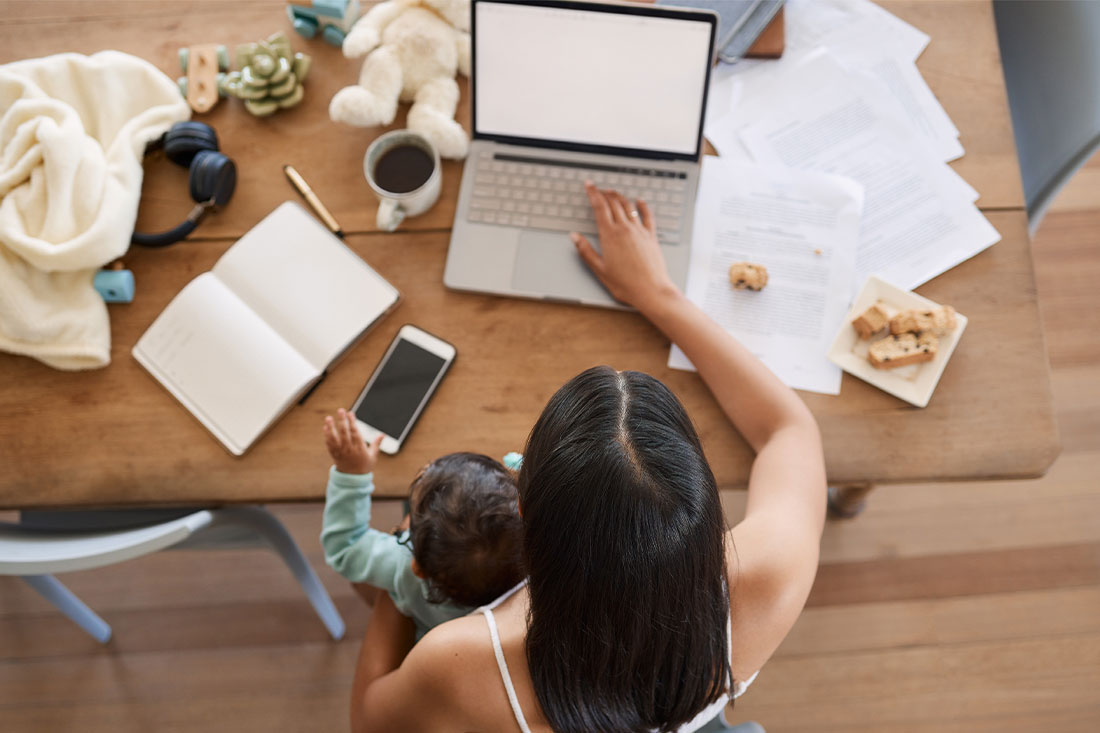 baby and woman with laptop with screen