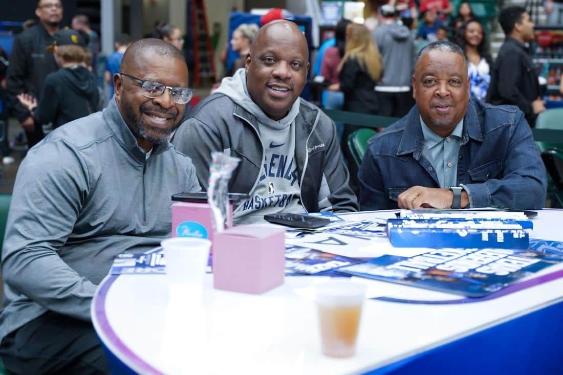 Hardy L. Pelt (center), flanked by Todd F. Brown, UEN President, and Spud Webb, Texas Legends General Manager, and former NBA Star (source: UEN)