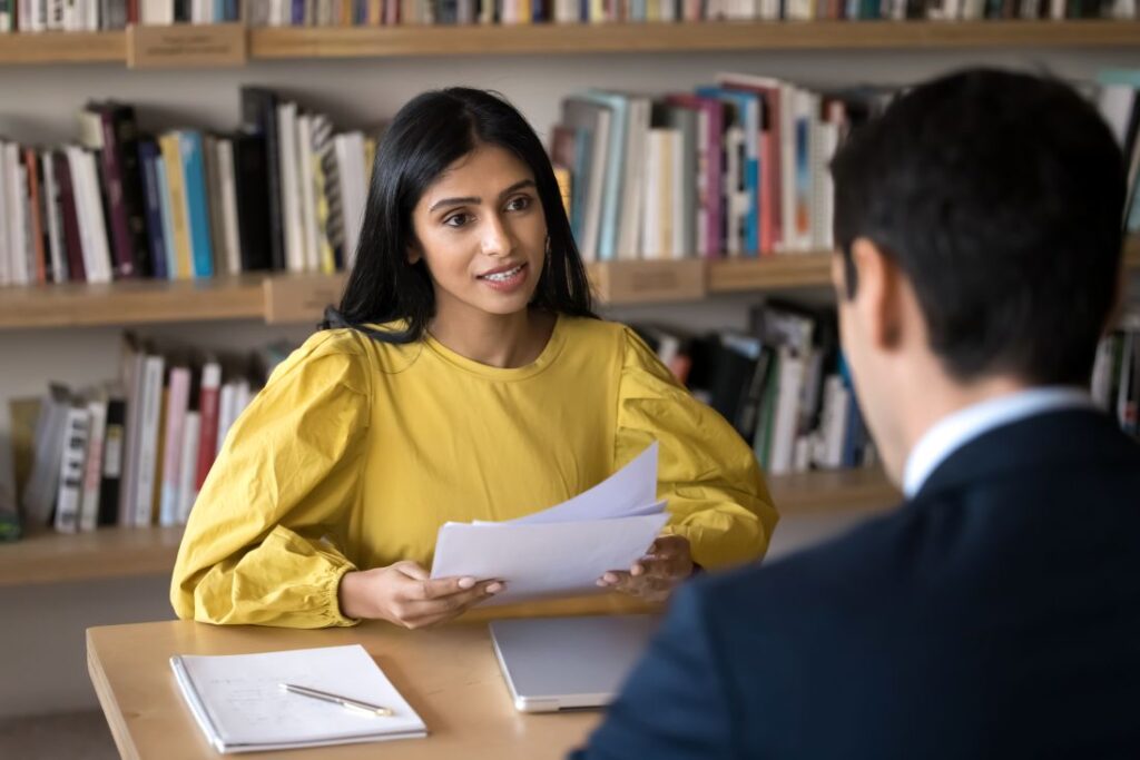 a hiring manager interviewing a job applicant
