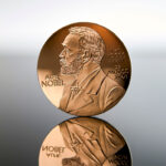 Close-up of a copy of the Nobel Prize medal.